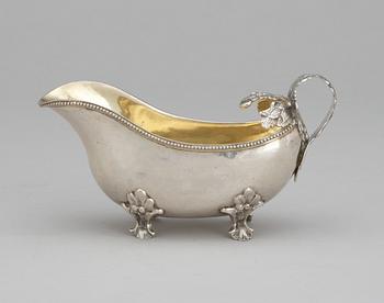 384. A Swedish 18th century parcel-gilt cream-jug, makers mark of Anders Schotte, Uddevalla 1797.