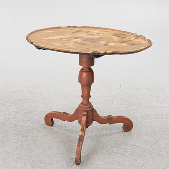 A folding table, 19th century.