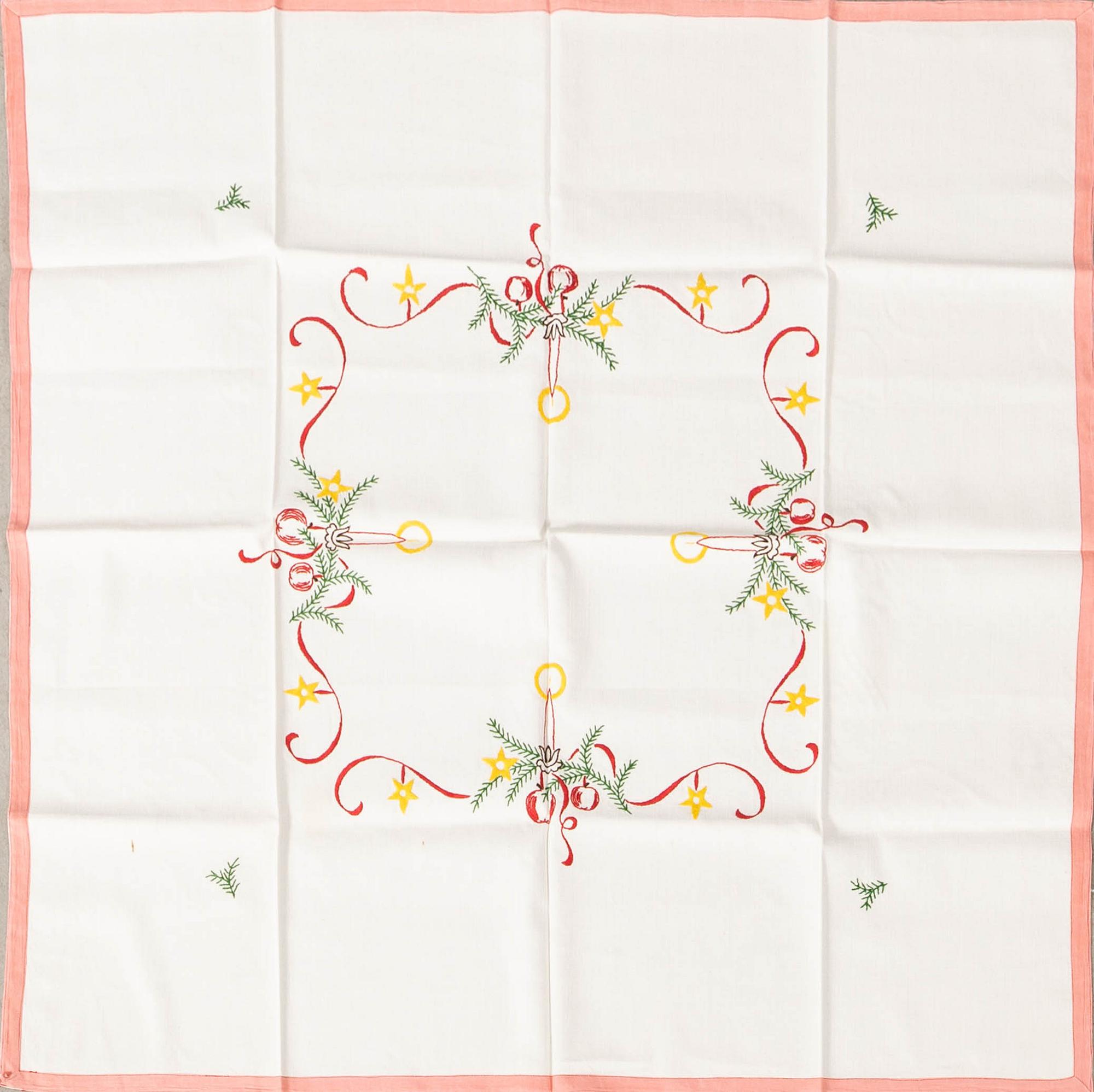 A collection of Christmas tablecloths 12 pcs first half/mid 20th century.