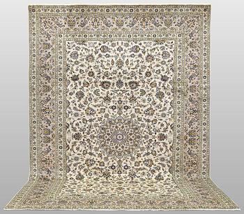A Keshan carpet, c. 355 x 243 cm.
