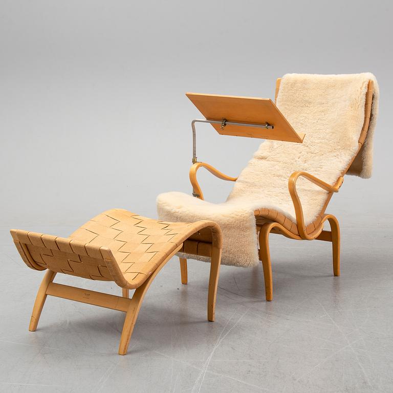 Bruno Mathsson, a 'Pernilla' armchair and a stool, Karl Mathsson, Värnamo, 1950's/60's.