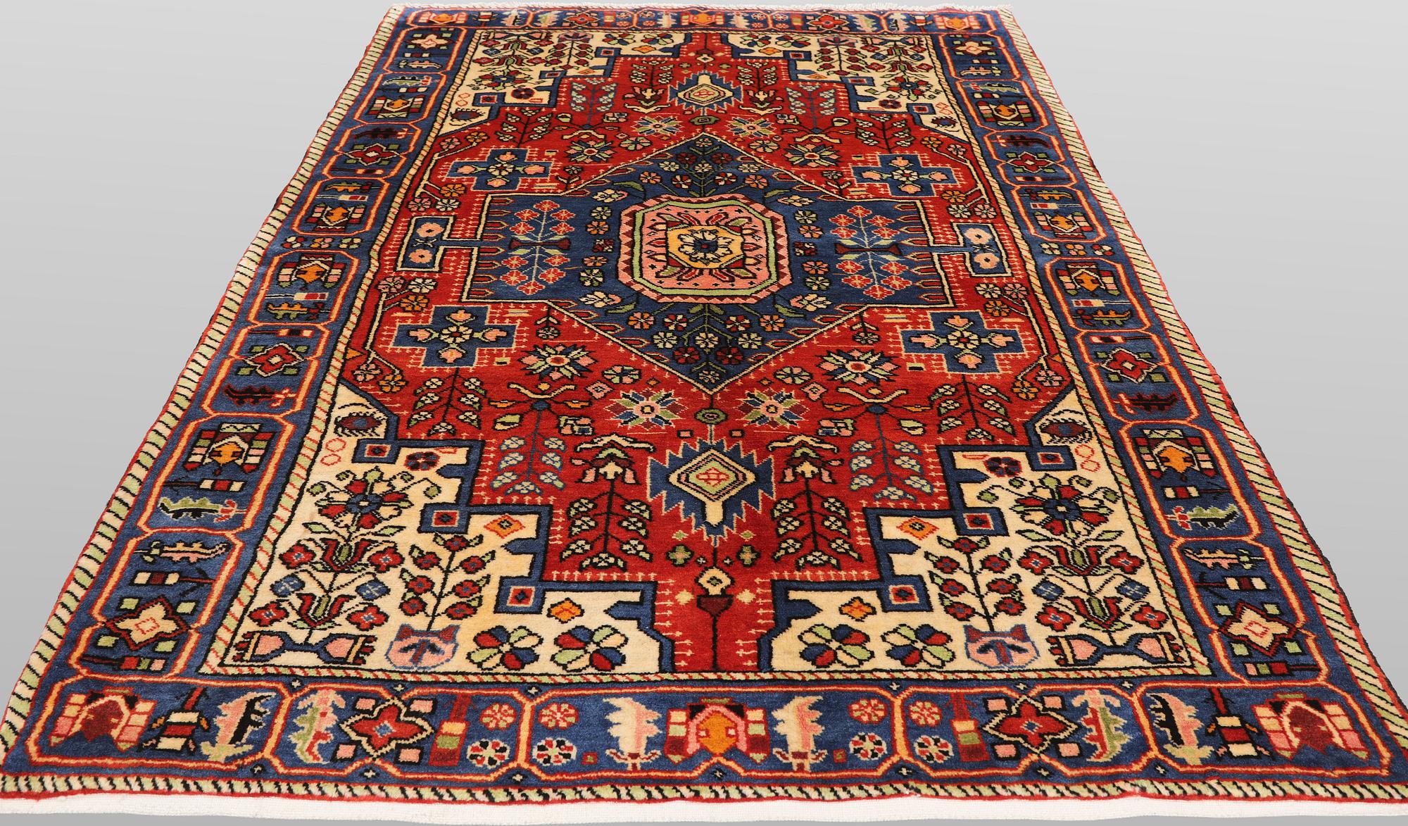 A Hamadan rug, 213 x 138 cm.