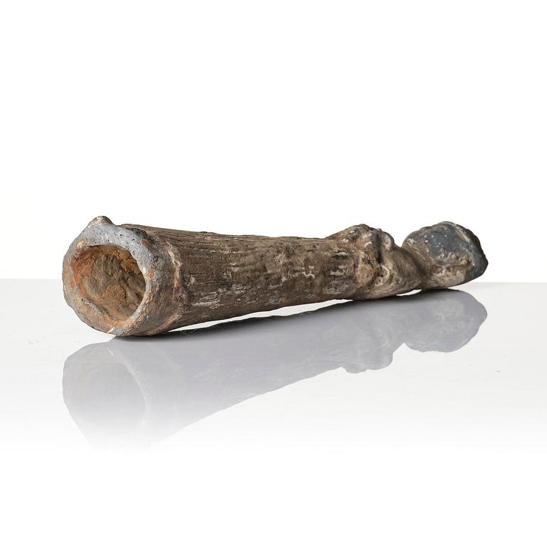 A pottery figure of a lady, Han dynasty (220 BC-206 AD).