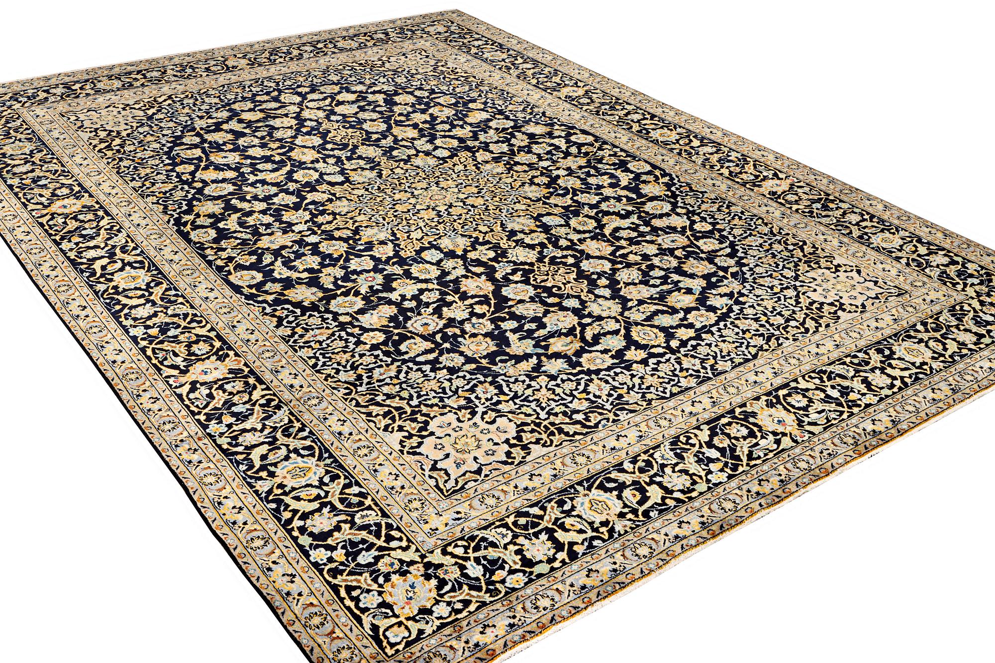 A Keshan carpet, c. 422 x 306 cm.