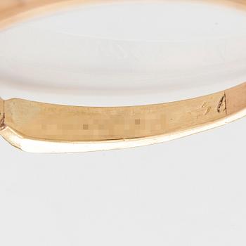 Ring in 18K gold with a brilliant-cut diamond.