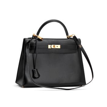 622. HERMÈS, a black leather, "Kelly 32".