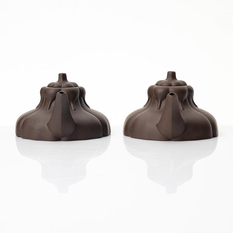 Two similar 'magnolia flower six-petal' yixing teapots, China, 1980s.