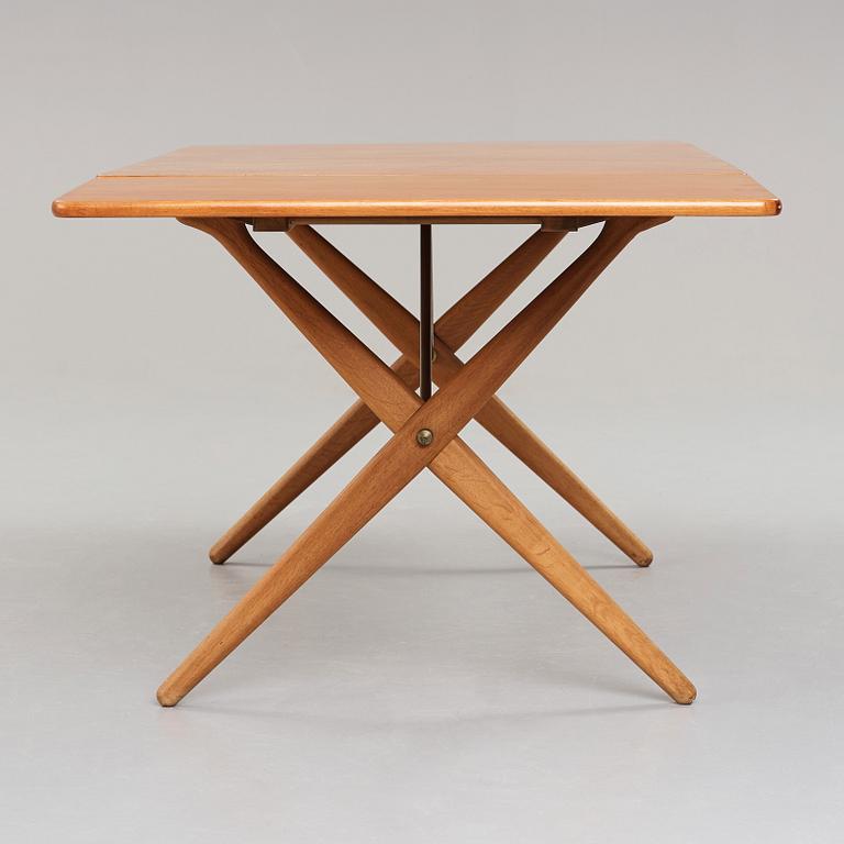 Hans J. Wegner, a teak and oak drop-leaf dining table, Andreas Tuck, Denmark 1950'-60's.