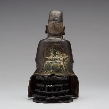 A bronze sculpture of a daoist dignitary, Ming dynasty (1368-1644).