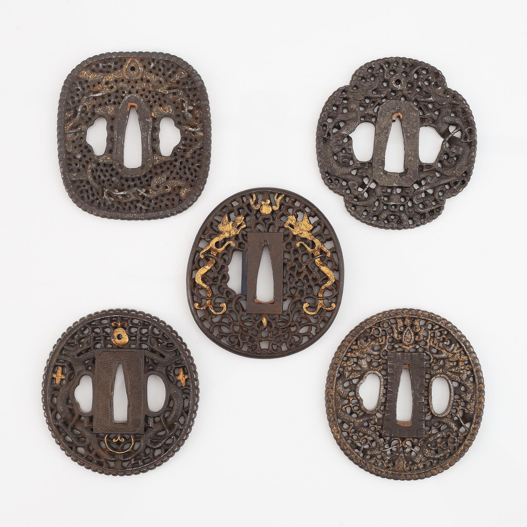 Five Chinese and Japanese tsubas. 18/19th Century.