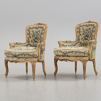 A Rococo 18th century bergere. One later, very similar, bergere included.