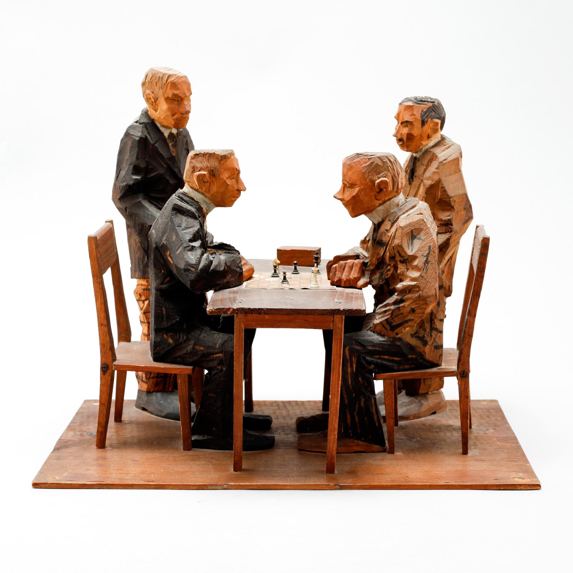 AXEL PETERSSON DÖDERHULTARN, sculpture group, partially painted carved wood, Chess players, stamp signed.