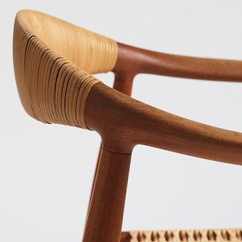 Hans J. Wegner, a pair of teak and rattan 'The Chair', JH-503, Johannes Hansen, Denmark 1950s.