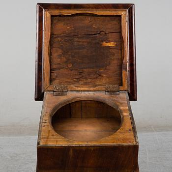 A Swedish Empire bedside table, early 19th century.