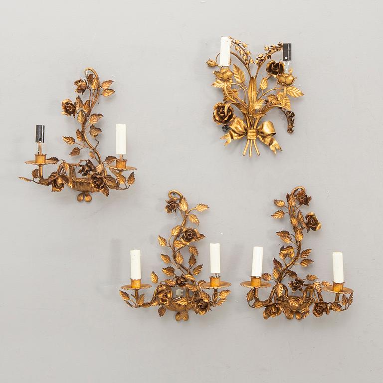 A set of four bronzed Rococo-style walls scones mid 1900s.