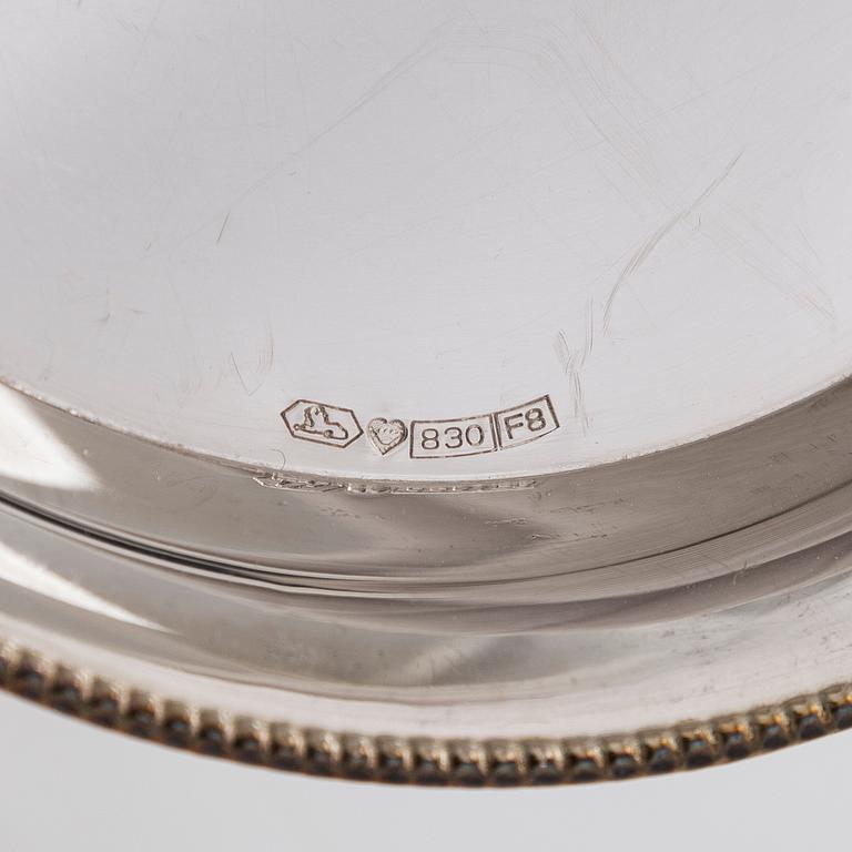 A set of twelve silver coasters and cocktail sticks 11 pcs,  Suomen Kultaseppä Oy 1935 and Kultakeskus 1983.