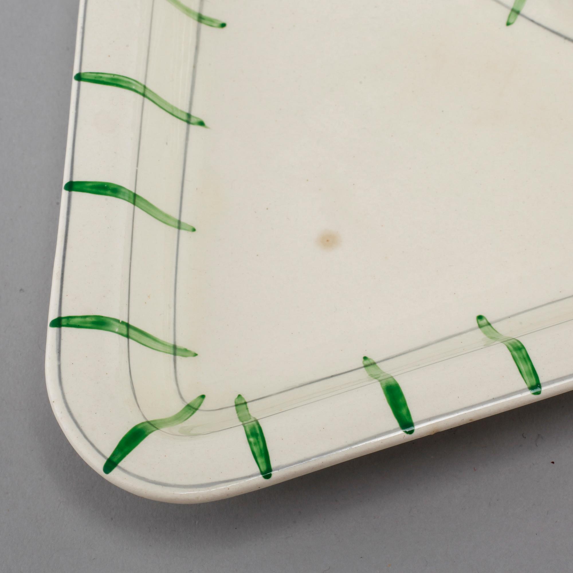 An earthenware tableware set of 62 pcs, 'Spaljé', designed by Wilhelm Kåge for Gustavsberg, around mid 20th century.