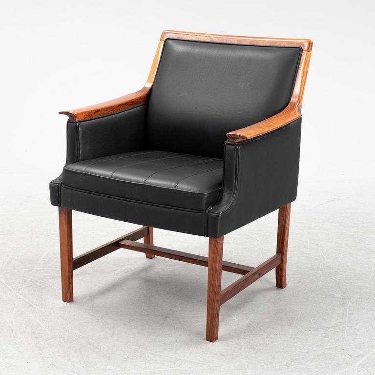 Torbjørn Afdal, a 'Minerva' rosewood desk and a chair, Bruksbo, Haug Snekkeri AS, Norway, 1960's.