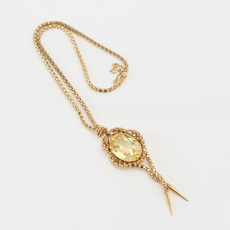 Necklace 18K gold with an oval faceted green synthetic spinel.