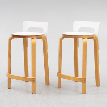 Alvar Aalto, a pair of K 65 bar stools,  Artek.