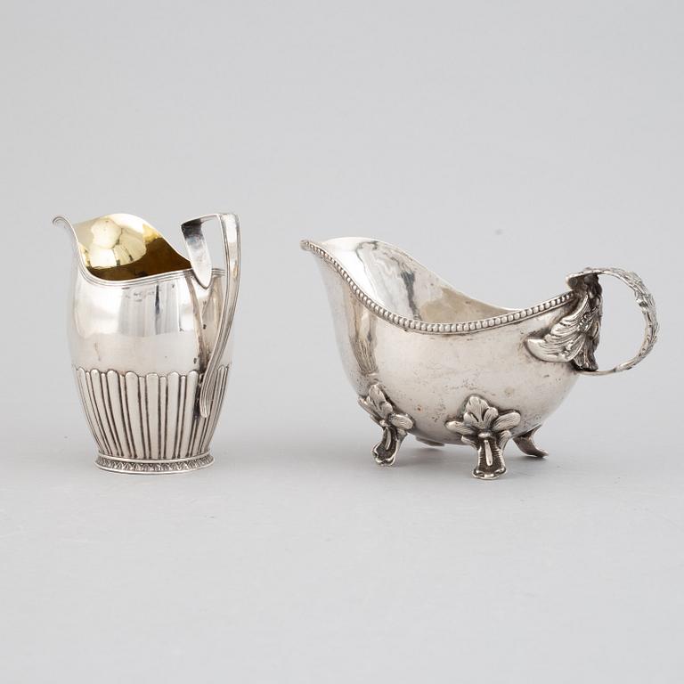 Two creamers, silver, one german and one Johan Petter Grönvall, Stockholm 1827.