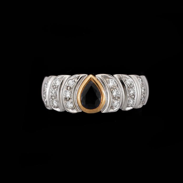 RING, 18k guld med safir och briljantslipade diamanter tot ca0,18ct. Vikt 5,4g.