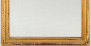 A gilt wood mirror and marble top console table, early 20th Century.