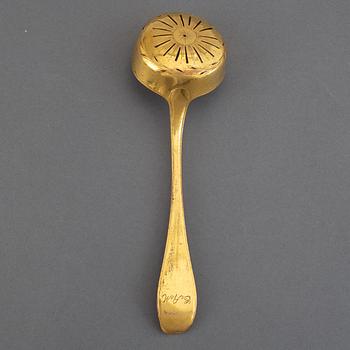 A Swedish 18th century gilt-metal caster-spoon.