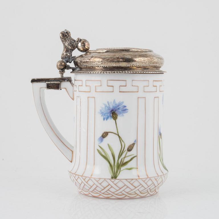 A porcelain tankarnd with older silver mounted lid, Royal Copenhagen, Denmark, 1889-1922.