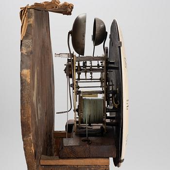 A long-case clock, 19th century.