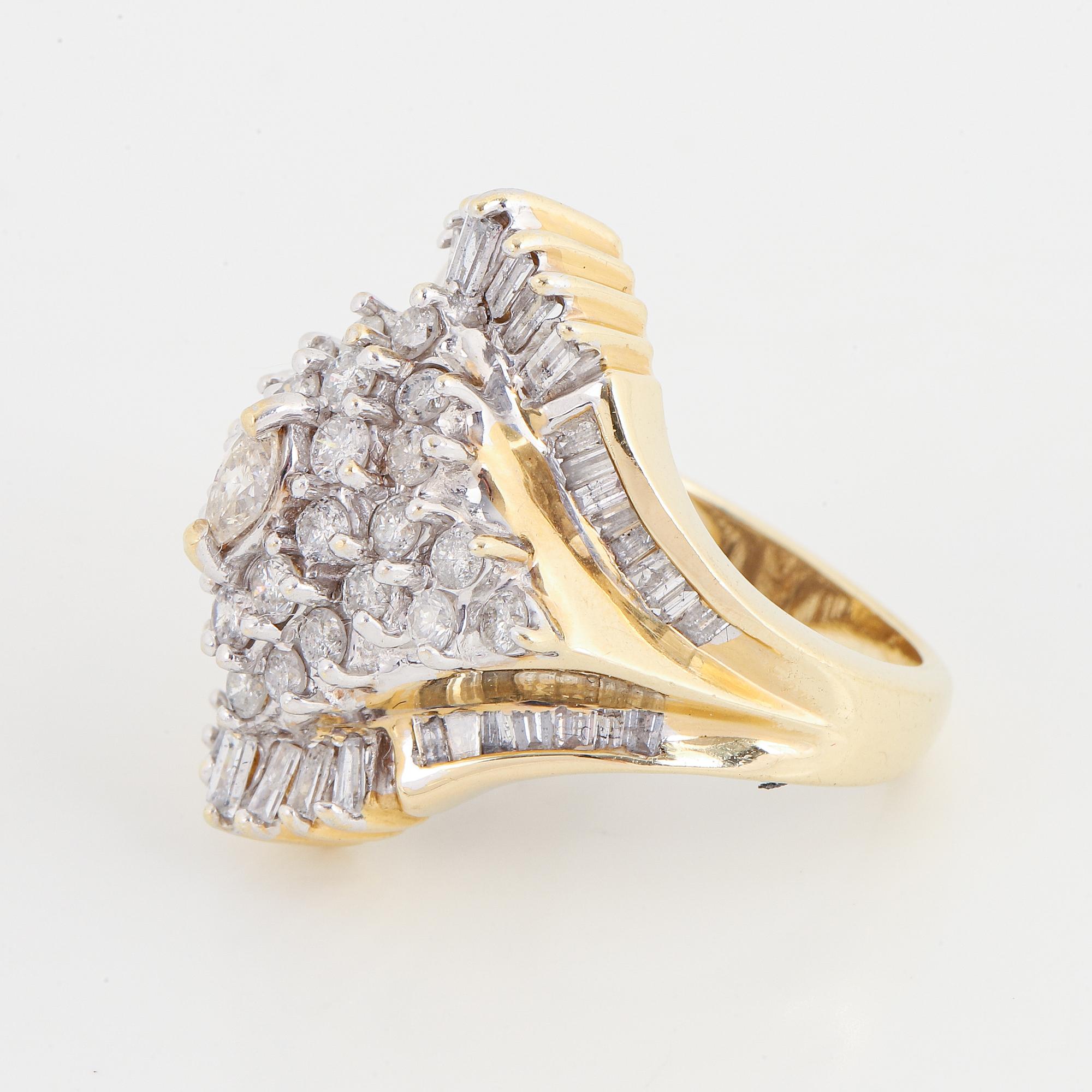 14K gold and diamond ring.