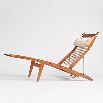 Hans J. Wegner, an oak lounge chair model "JH 524", Johannes Hansen, Copenhagen.