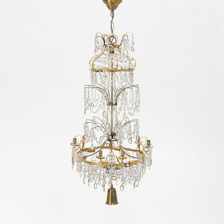 A Gustavian style chandelier with older parts, late 18th and 20th century.