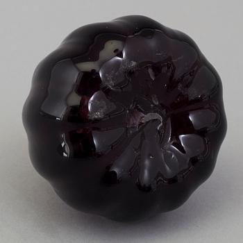 A 18th century glass ink-bottle.