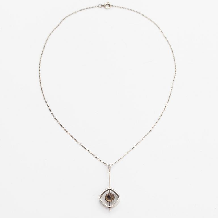 Elis Kauppi, A silver necklace with a smoaky quartz. Kupittaan kulta, Turku.