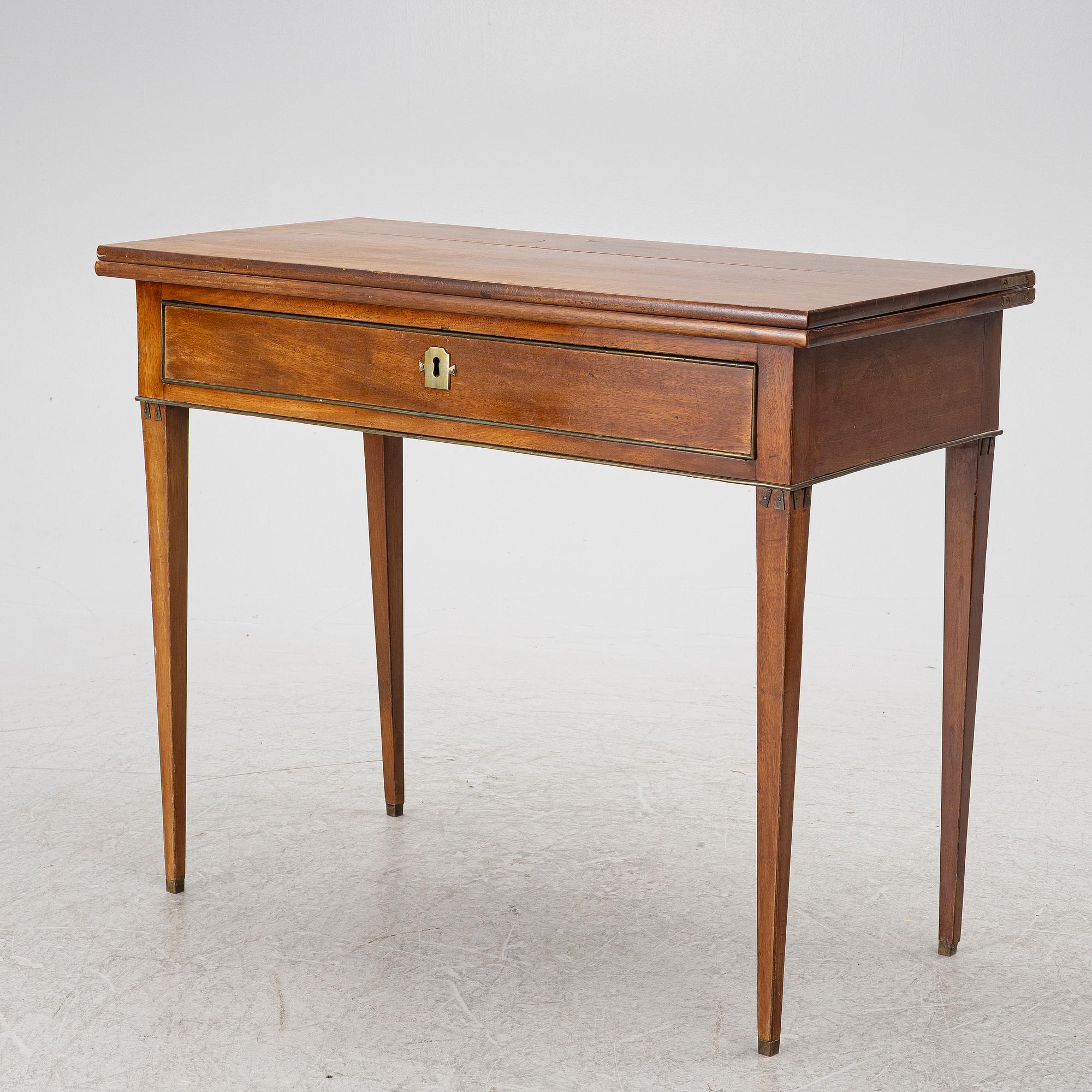 A late Gustavian mahogany cards table, Stockholm, late 18th century.