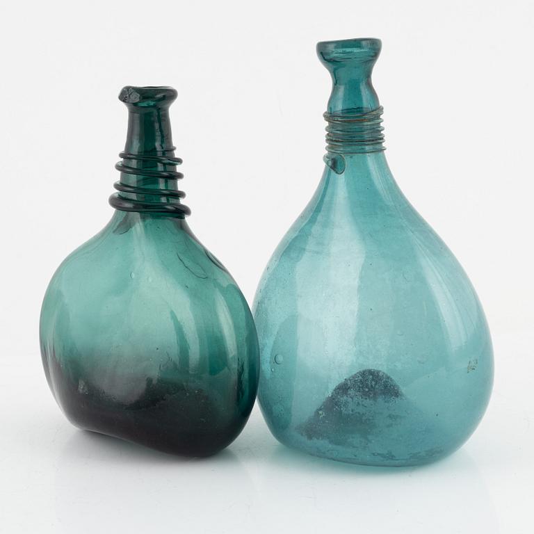 A set of two glass bottles, 19th century.