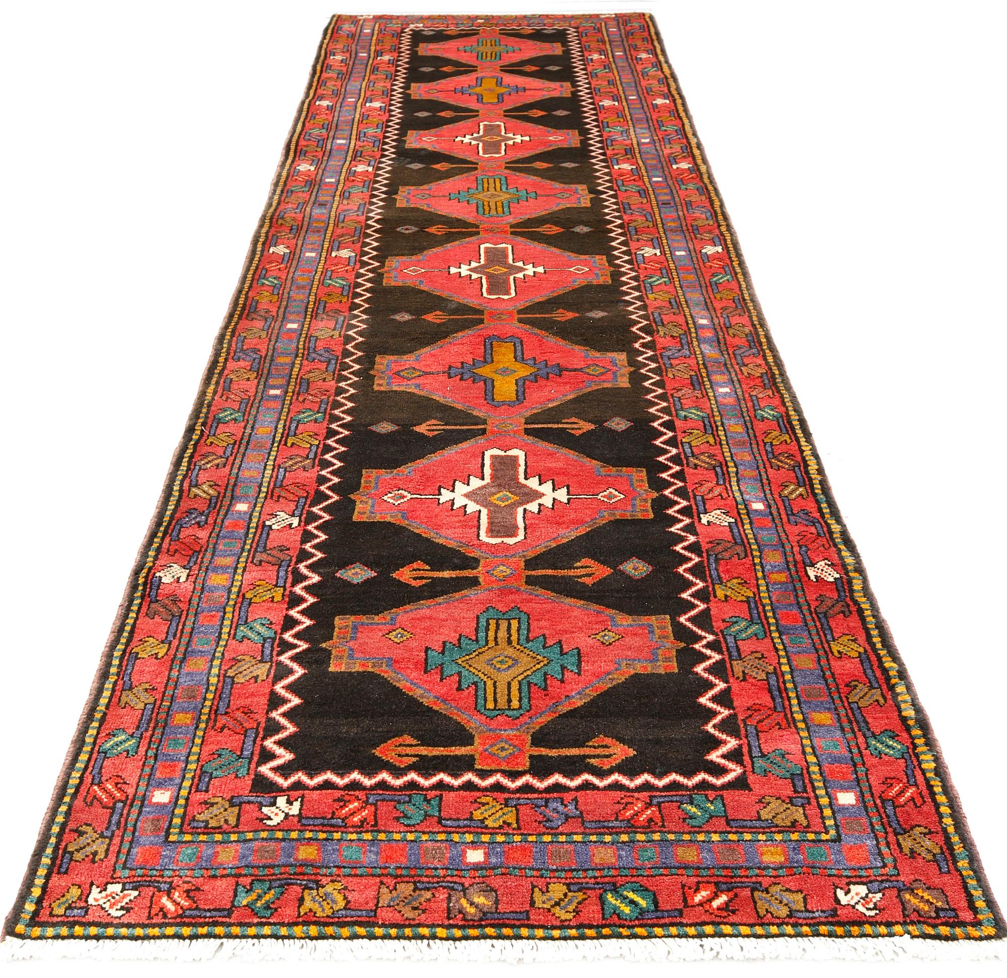 A Tabriz rug, approx. 448 x 114 cm.