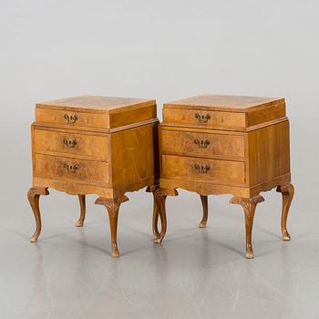 A pair of Rococo-style bedside tables.