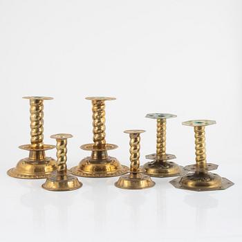 Three pair of brass Baroque style candlesticks, around 1900.