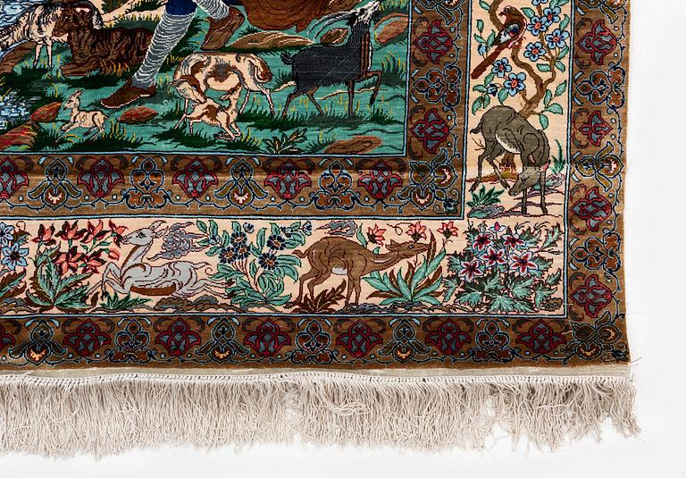 A silk Qum rug, Central Persia, signed, c. 135 x 208 cm.