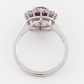 A rhodolite garnet and brilliant cut diamond ring.