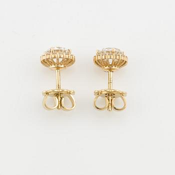 Earrings with brilliant-cut diamonds, including IGI report.