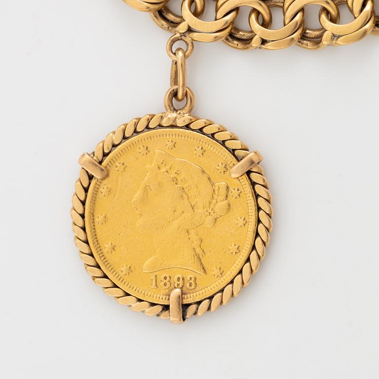 Armband guld bismarcklänk med berlocker med guldmynt.