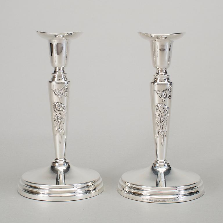 A pair of silver candlesticks by Meya Lerible for Mema, Linköping 1994.