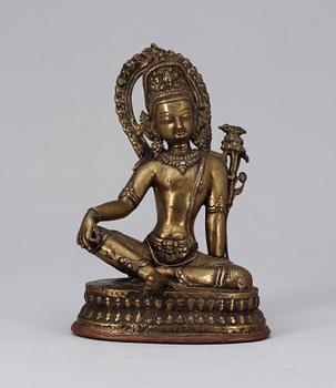 566. A bronze Buddha, 19th Century Tibet.