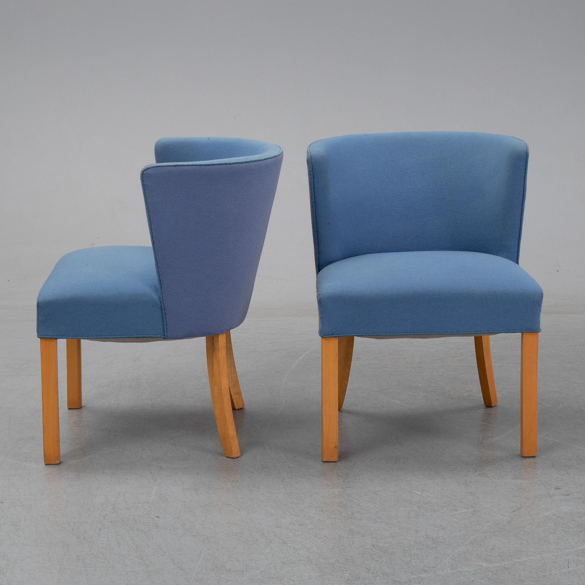 Fritz Henningsen, a pair of beech easy chairs, Fritz Hansen, Denmark.