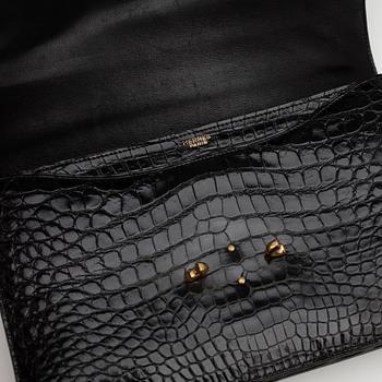 HERMÈS, a black crocodile leather shoulder bag.