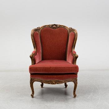 A Lous XV-style armchair, second half of the 20th century.