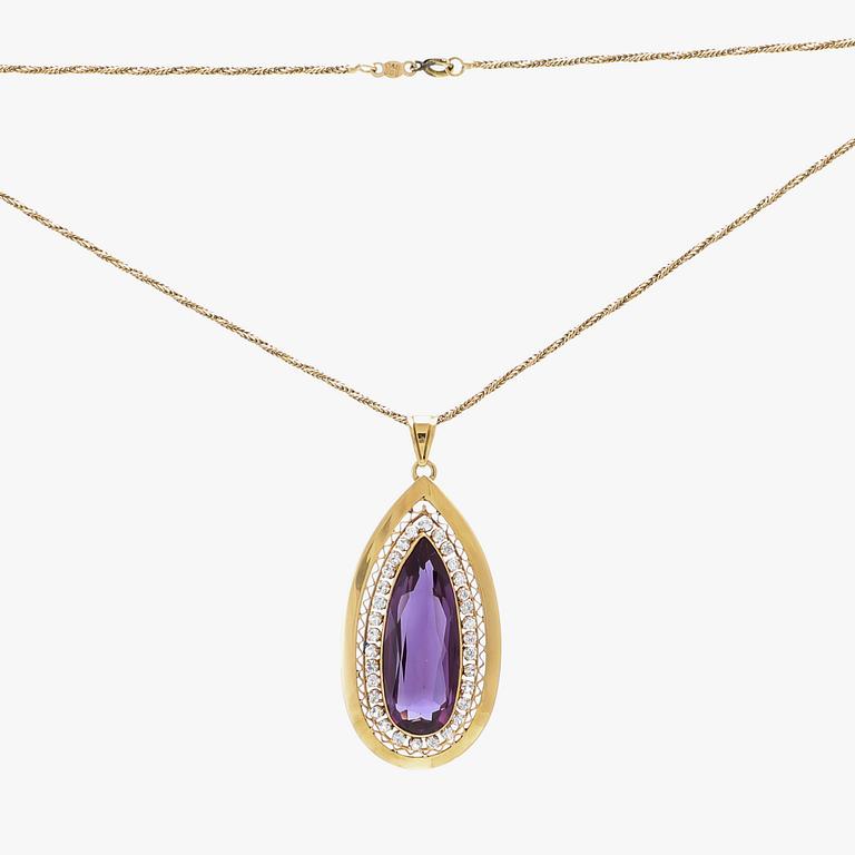 Necklace 18K and 14K gold with faceted synthetic purple sapphire.
